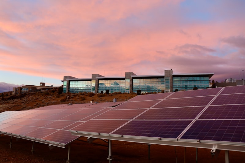 Commercial rooftop solar installation at dusk